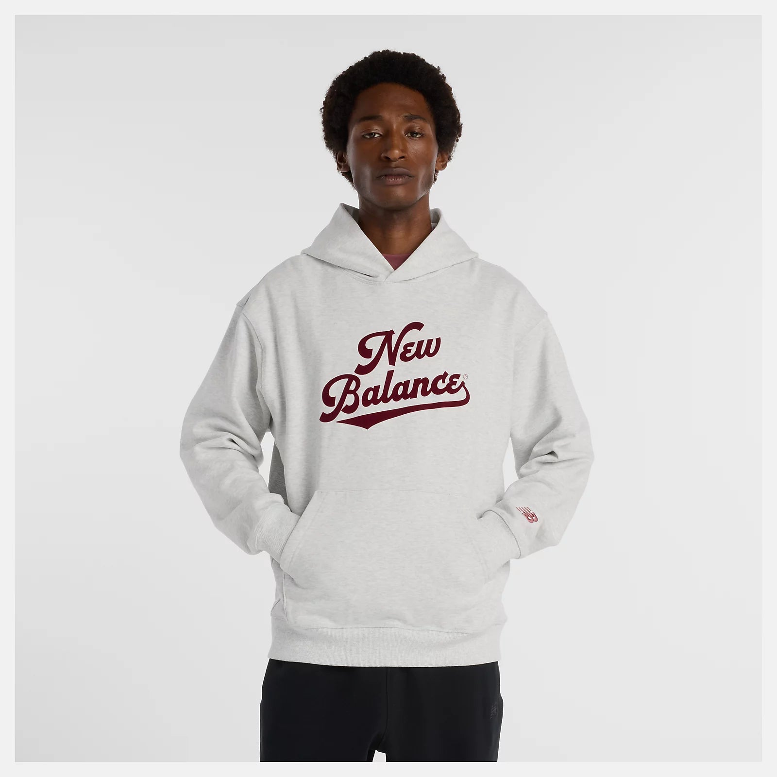 NEW BALANCE -ATHLETICS LEGACY HOODIE ASH HEATHER